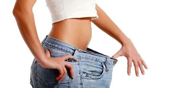 The girl lost weight in her abdominal area by removing unhealthy foods from her diet. 